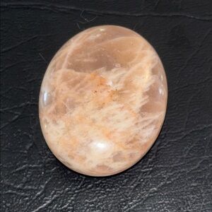 Peach moonstone palm stone